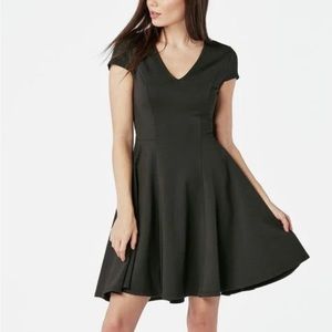 Black fit and flare dress with cutout back